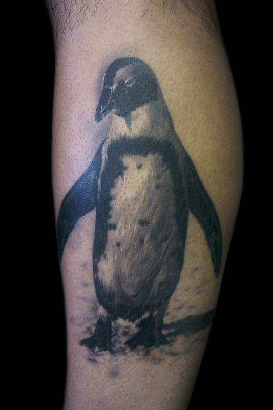 Francisco Sanchez - penguin tattoo 